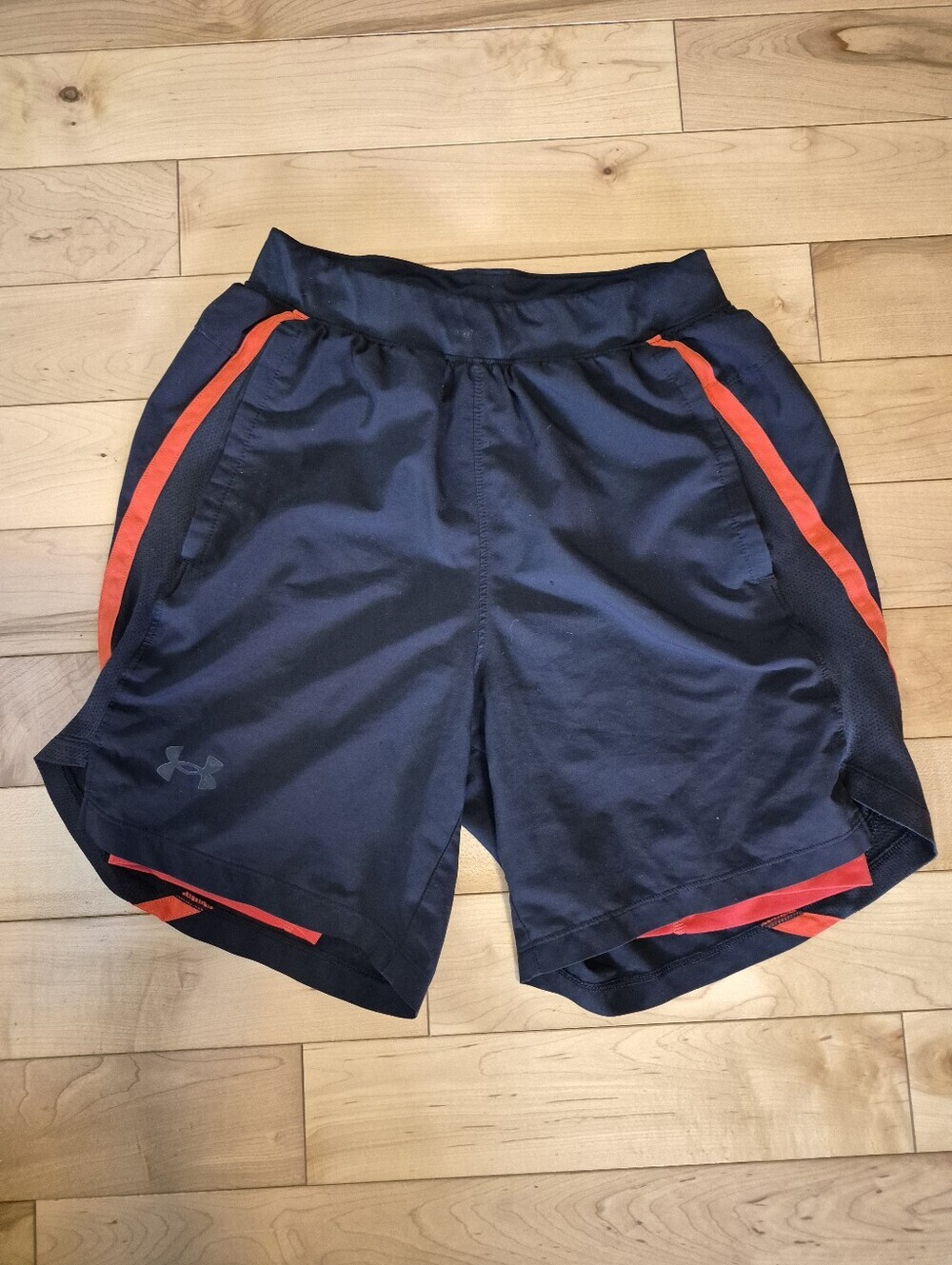 Under Armour women's size small black and orange shorts